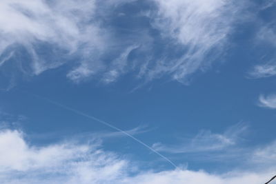 Low angle view of vapor trail in sky