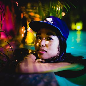 Portrait of young woman in swimming pool