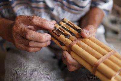  sumpotan, a mouth organ made from gourd with bamboo pipes in the northern borneo, sabah, malaysia.