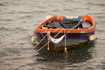 High angle view of boat sailing in sea