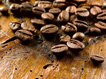 Close-up of coffee beans on table