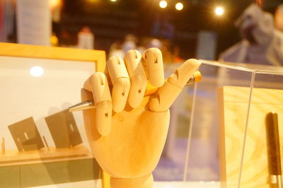 Close-up of yellow toys on table