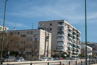 Athens, greece - february 12, 2020. beautiful streets of athens with blocks of flats, cars and shops