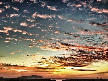 Scenic view of dramatic sky during sunset