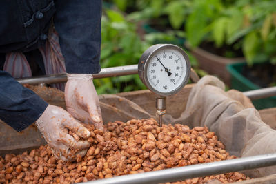 Man working at market stall