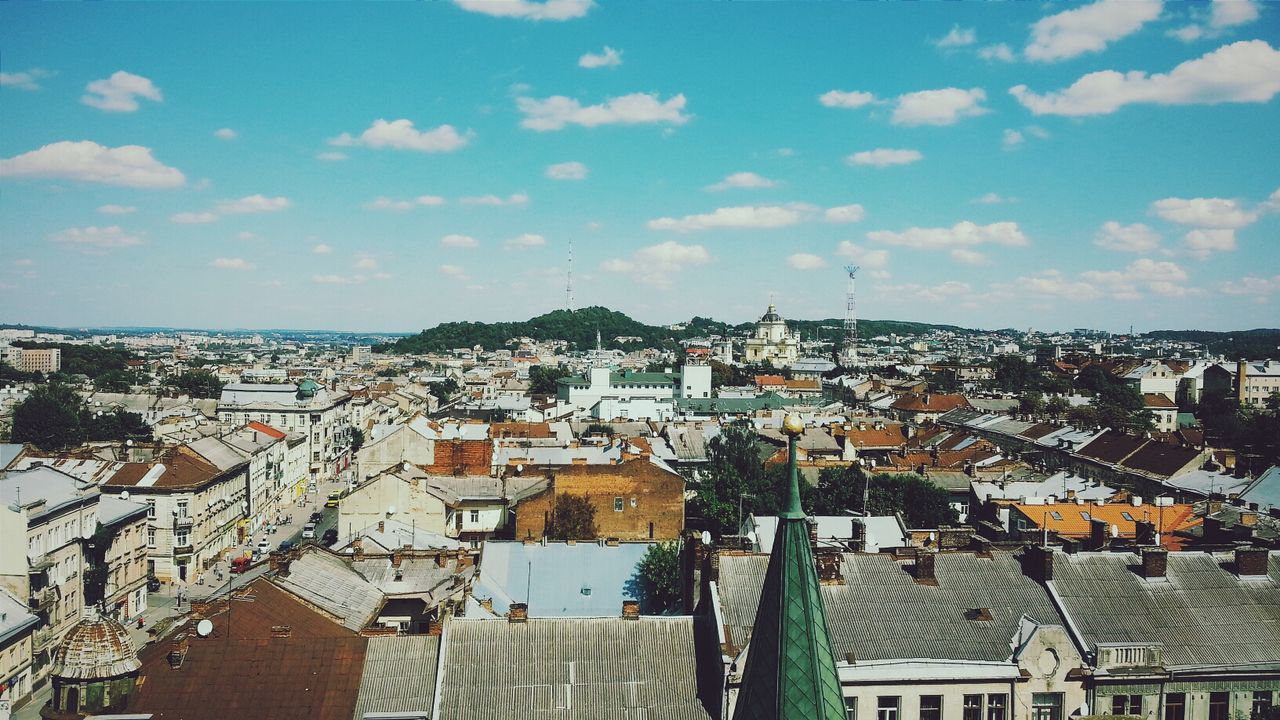 building exterior, architecture, built structure, residential district, residential structure, cityscape, crowded, residential building, roof, city, sky, high angle view, house, townscape, town, cloud - sky, cloud, day, human settlement, community