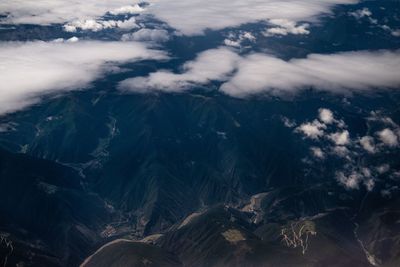 Aerial view of mountains against sky