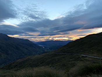 Scenic view of mountains against sky during sunset