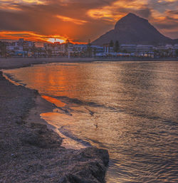 Sunset over the arenal bay, javea, alicante, spain,