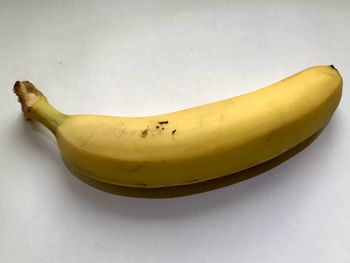 High angle view of banana against white background