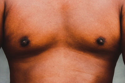 Close-up of shirtless man