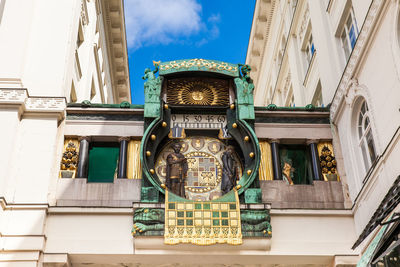 Low angle view of ornate building against sky