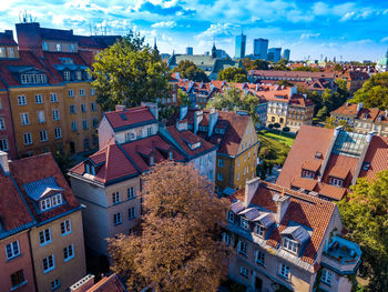 Aerial view of the red tiled roofs of the old town of warsaw, poland