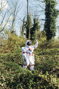 Man standing in forest