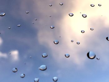 Close-up of water drops on glass