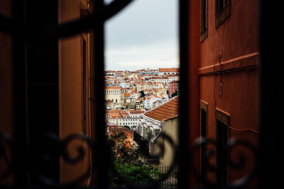 City seen through fence