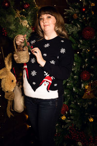 Portrait of a girl with christmas tree