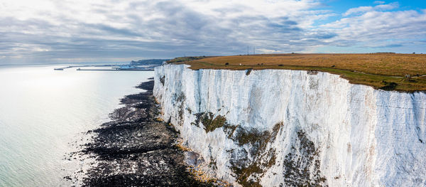 Aerial view of the white cliffs of dover. close up view of the cliffs from the sea side.