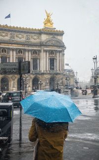 View of wet street during rainy season