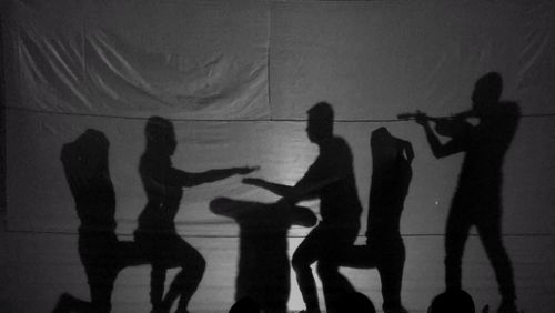 Silhouette people shadow on hand