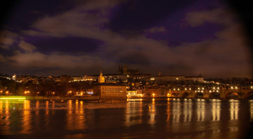 Illuminated buildings in city at night