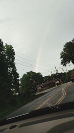 Road seen through car windshield