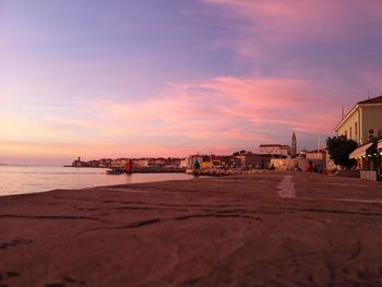 View of beach against sky during sunset