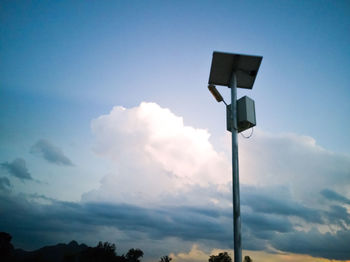 Low angle view of street light against sky