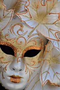 Close-up of venetian mask at market
