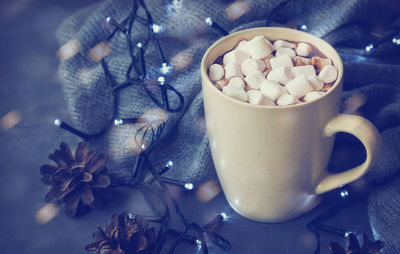 Close-up of coffee cup on table