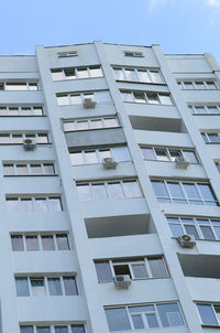 Low angle view of modern building against clear sky