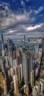 High angle view of modern buildings against sky in city