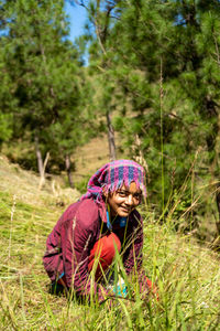 Portrait of an indian female farmer in traditional dress. indian girl farmer working in the fields.