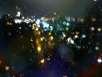 Full frame shot of illuminated water drops