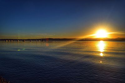 Scenic view of sunset over sea