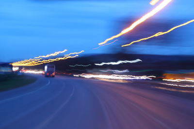 Light trails on road at night