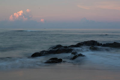 Scenic view of sea against sky at sunset