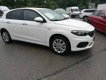 Side view of car parked on road