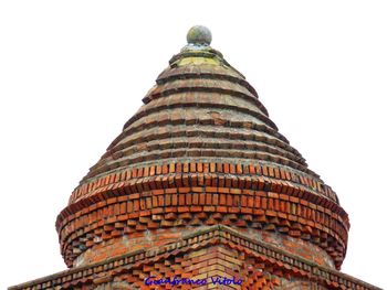 Low angle view of temple building against clear sky