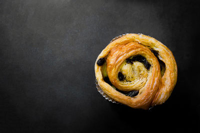 High angle view of dessert against black background