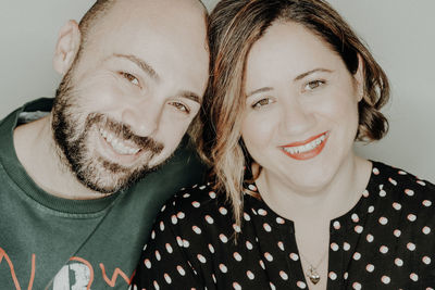 Close-up portrait of happy couple