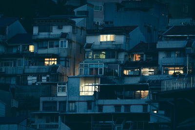 High angle view of illuminated buildings at night