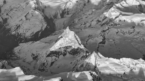 Scenic view of snow covered mountains