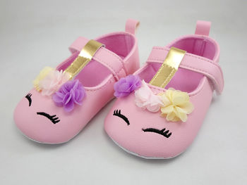 High angle view of multi colored heart shape on white table