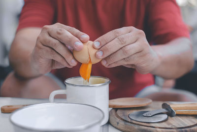 Close-up of hand holding ice cream