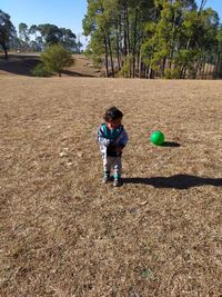 Boy playing on field