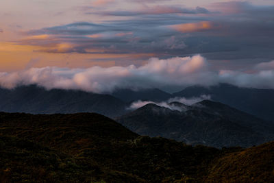 Scenic view of mountains against sky during sunset