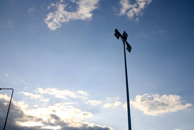 Low angle view of street light against sky