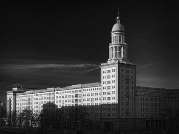 Low angle view of tower against sky in city