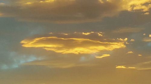 Low angle view of dramatic sky during sunset